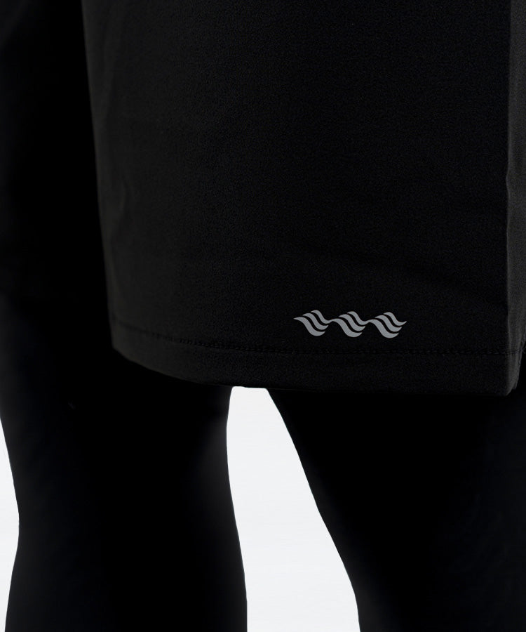 WaveWear black compression running shorts for men featuring a subtle logo on the hem
