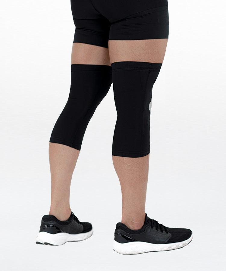 WaveWear black leg sleeves worn as kinesiology knee support sleeve for improved knee stability