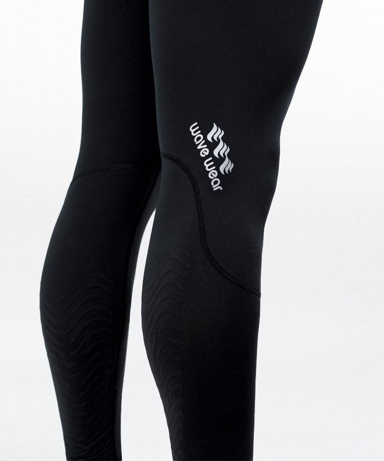 WaveWear black leggings with leg compression sleeves for runners providing support and comfort
