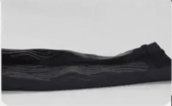 A hand slides over compression fabric with non-adhesive silicone