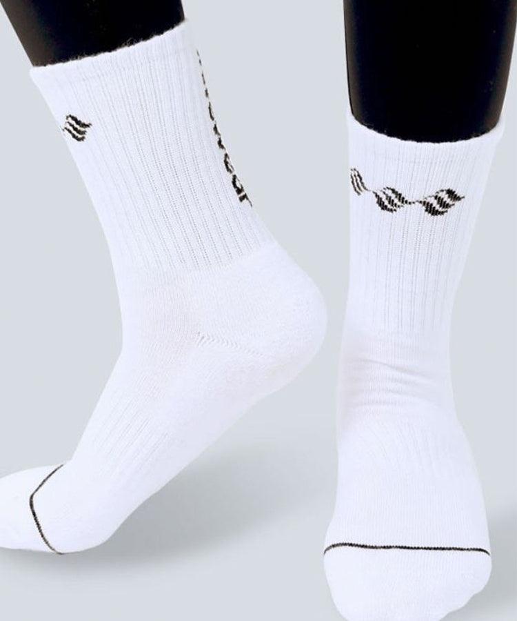 WaveWear white compression athletic socks with black logo and ribbed texture on mannequin feet