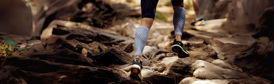 Runner wearing compression garments on calves, highlighting potential skin irritation from compression garments during outdoor activity