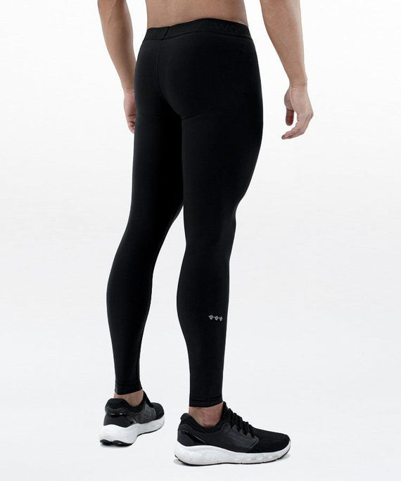 WaveWear black kinesiology tape leggings for men shown from the back with athletic fit and ankle length