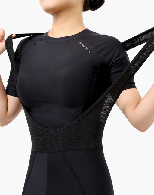 Women's Endeavor Cycling Bibshorts close-up of elastic mesh bib strap and WaveWear logo on breathable cycling top