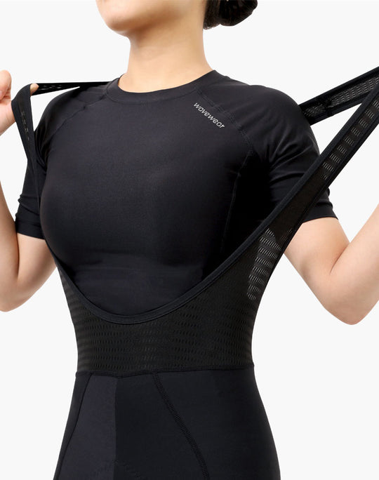 WaveWear black cycling bib shorts and shirt displaying kinesiology tape cycling gear style and fit