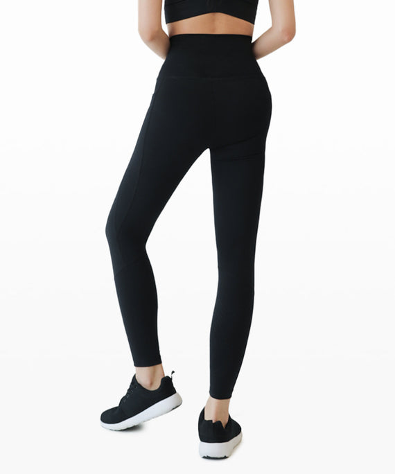 WaveWear black kinesiology tape leggings with pockets, high-waisted and fitted for active wear