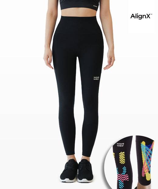 Y30 High-waist Kinesiology Compression Leggings front view in black on model with AlignX colorful taping zone inset
