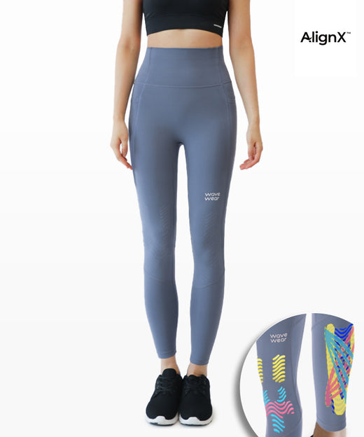 Y30 High-waist Kinesiology Compression Leggings front view in pale blue on model with AlignX colorful taping zone inset
