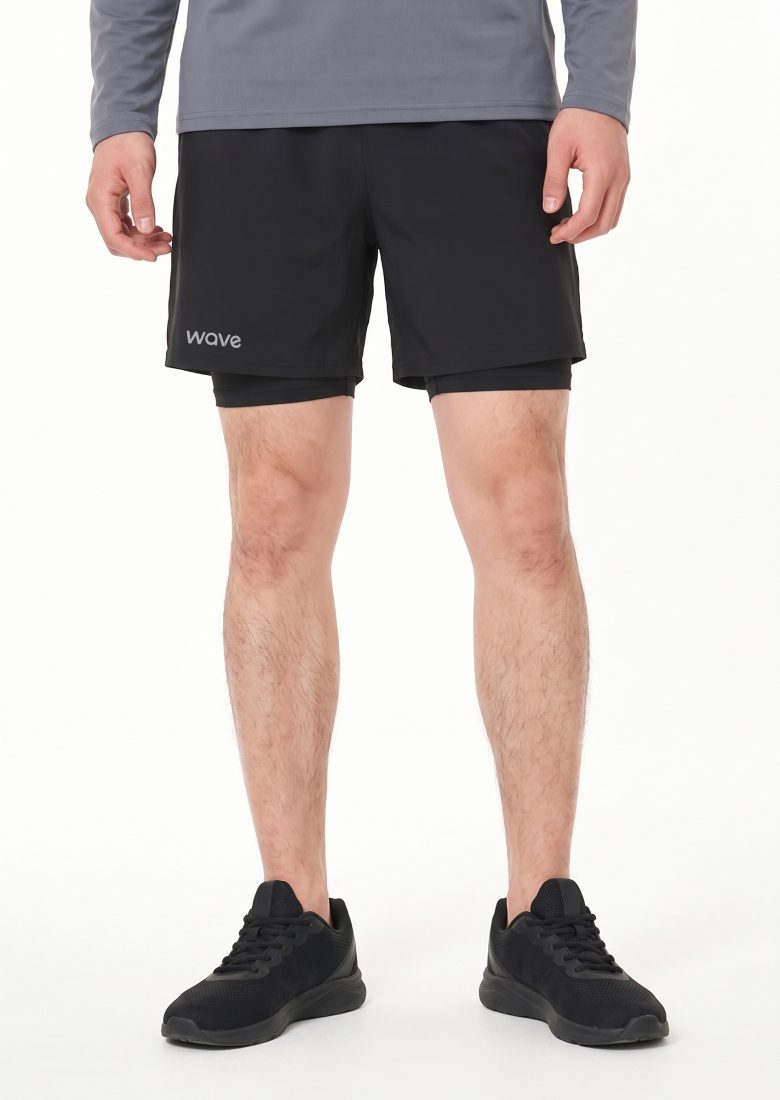 Full-length front view of the 2-in-1 shorts on model