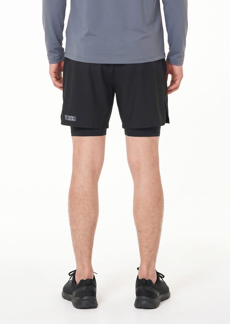 Full-length back view with the reflective label on the outer short