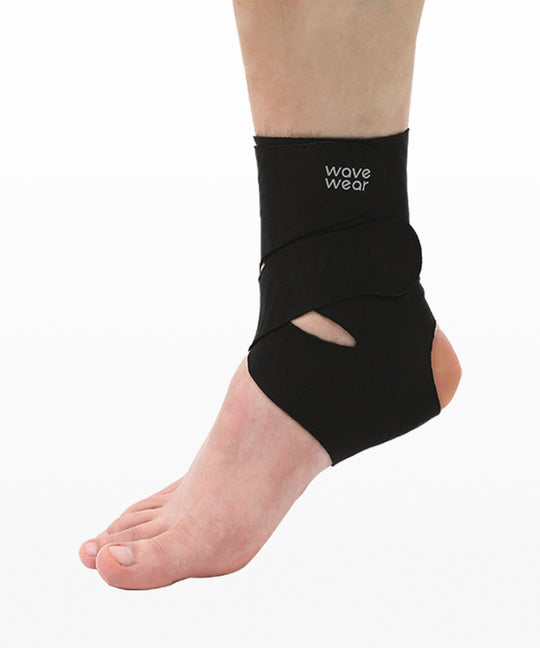 Black A1 ankle X-strap supporter side view showing cross-wrap design and WaveWear logo
