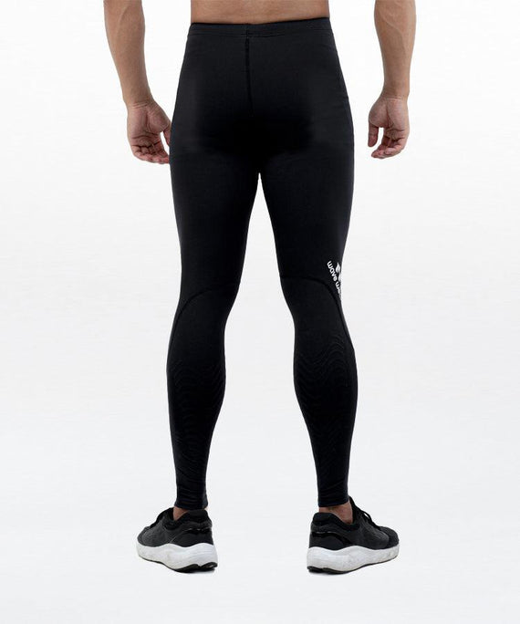 WaveWear black leg compression sleeves for runners modeled from the back with athletic shoes