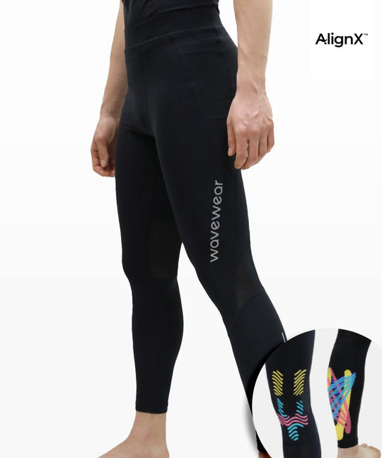 L30 Zipper Pocket Compression Leggings front view on model with AlignX logo and colorful kinesiology knee and calf taping zone inset