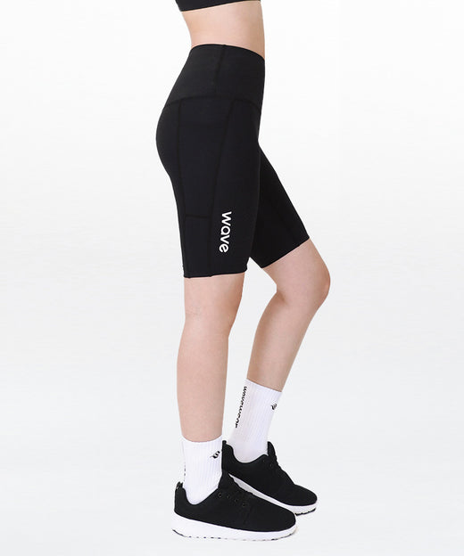 SY20 Thigh & Hamstring Taping Biker Shorts side view on model in black showing side pocket, wave logo on thigh, and high waist fit on white background