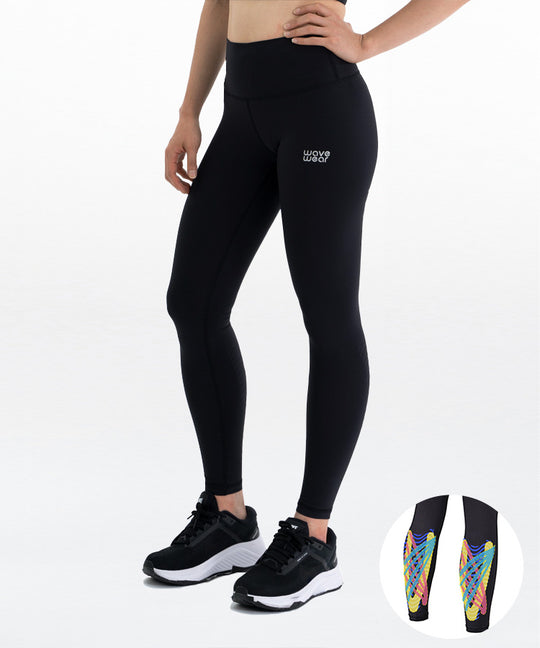 WaveWear Y10 Calf Therapy Tape Compression Leggings front view on model in black with high waist fit and colorful calf kinesiology taping zone product inset