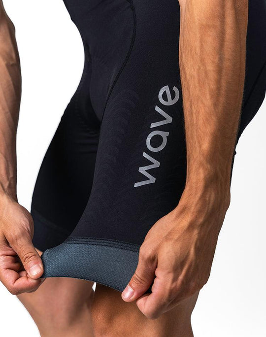 WaveWear compression cycling shorts for men in black with comfortable grip hem and logo print